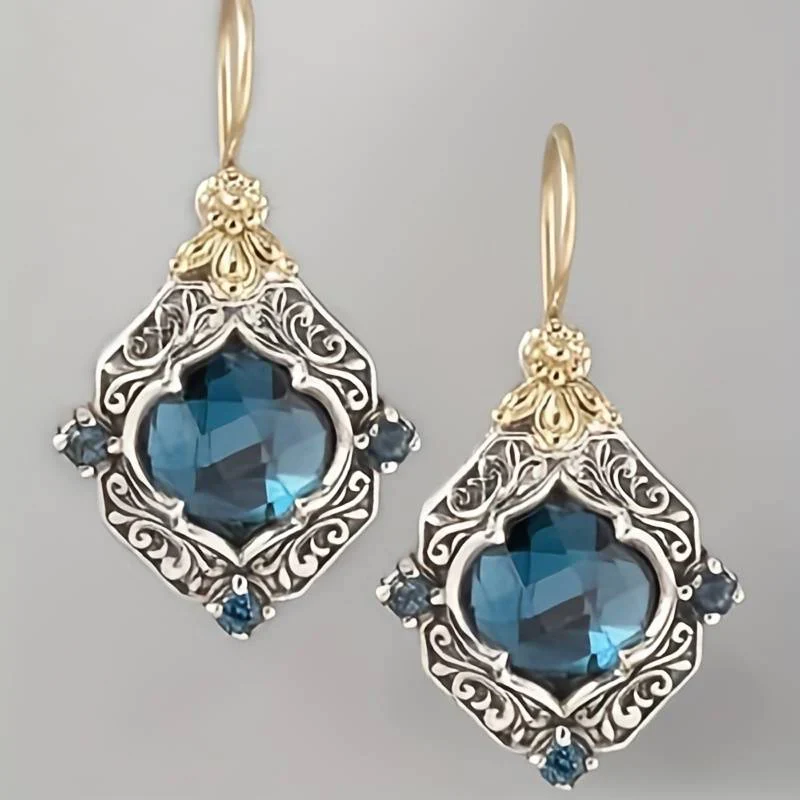 Blaue Kristall-Ohrringe in Gold und Silber