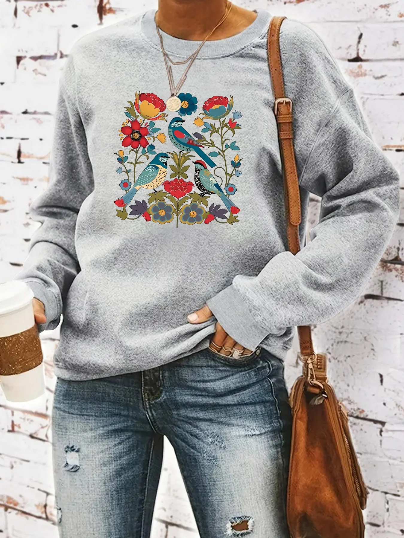 Damen Sweatshirt mit floralem Vogelmotiv und lässigem Schnitt - Image 11