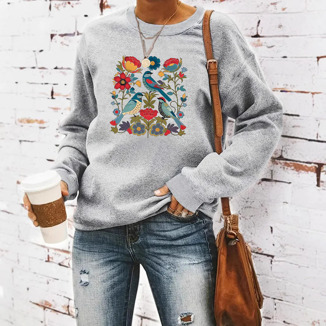 Damen Sweatshirt mit floralem Vogelmotiv und lässigem Schnitt - Image 3