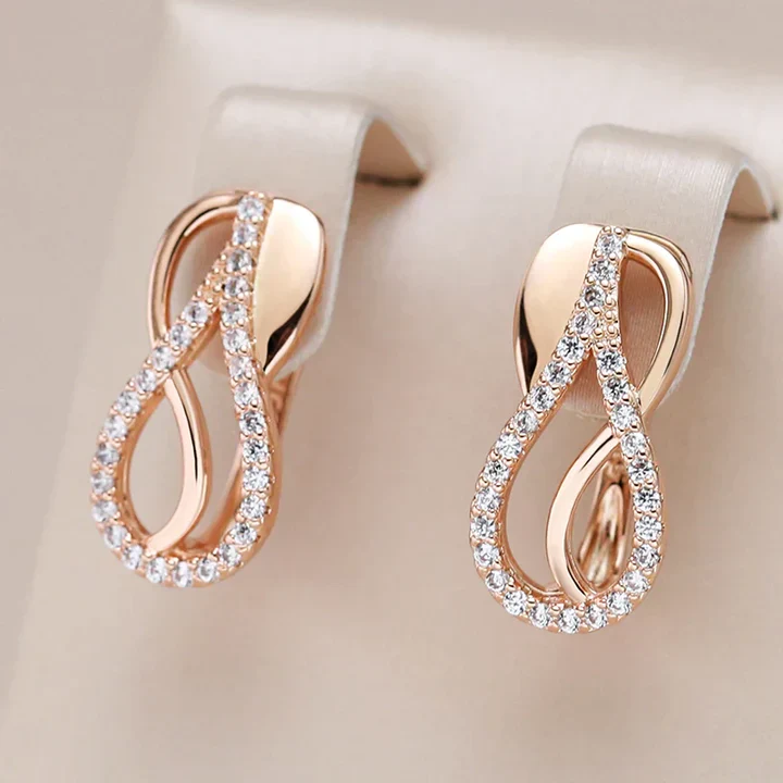 Elegante helle hohle Tropfen-Ohrringe
