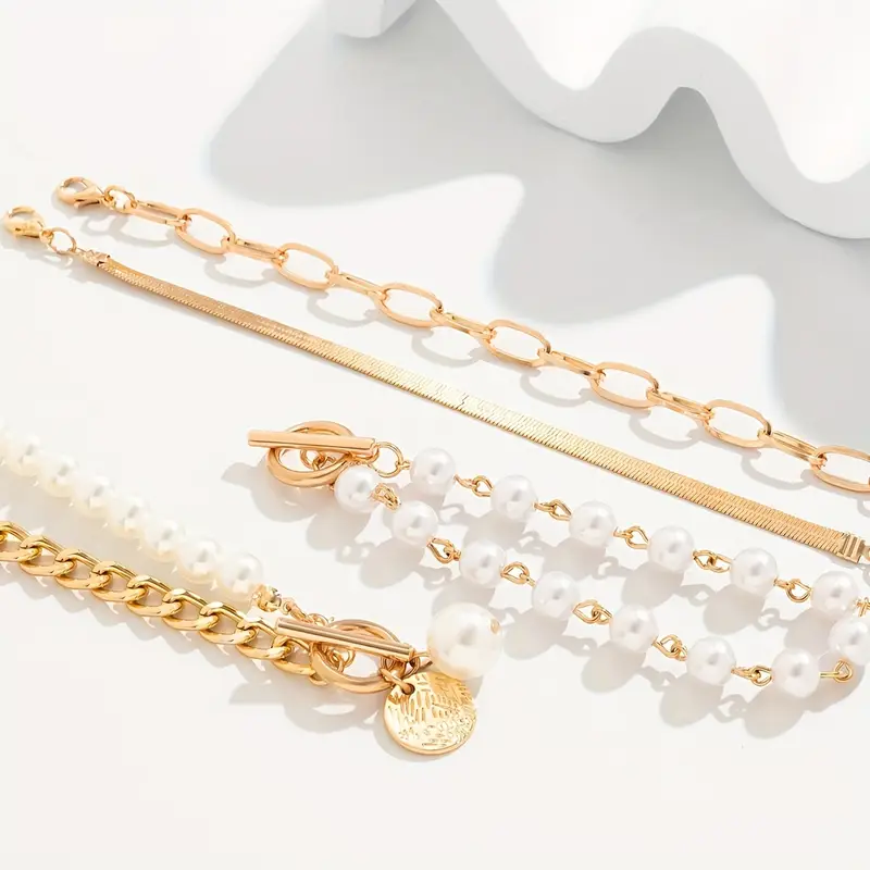 Elegantes 4-teiliges Armbandset in Gold – Schlange, Perlen & Glieder - Image 2