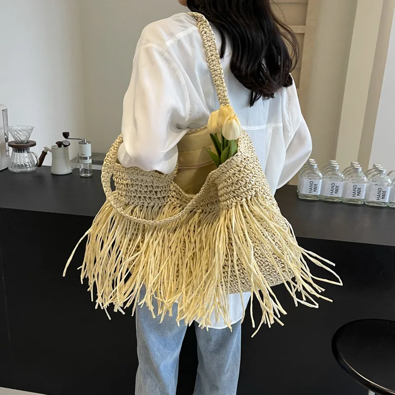 Geflochtene Tasche mit Fransen – Natürlicher und Boho-Stil - Image 3