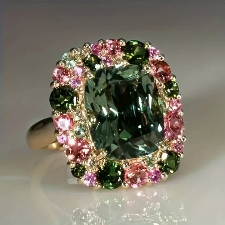 Vintage Ring mit grünem und rosa Kristall